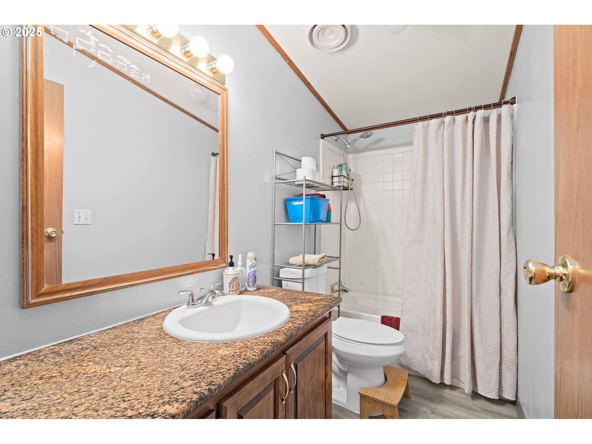 614 South 10th Street St. Helens, OR 97051 - Photo 24 of 32 a bathroom with a sink toilet a mirror and shower