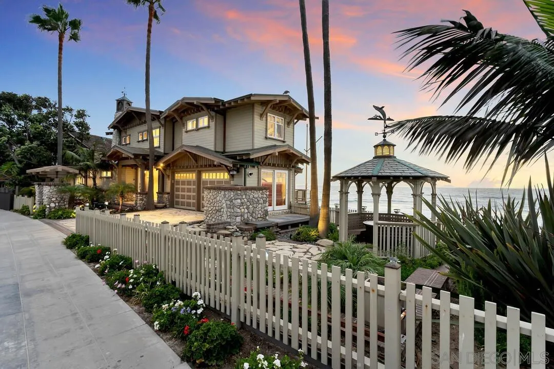 274 Coast Boulevard La Jolla, CA 92037 - Photo 53 of 64 a front view of a house having yard