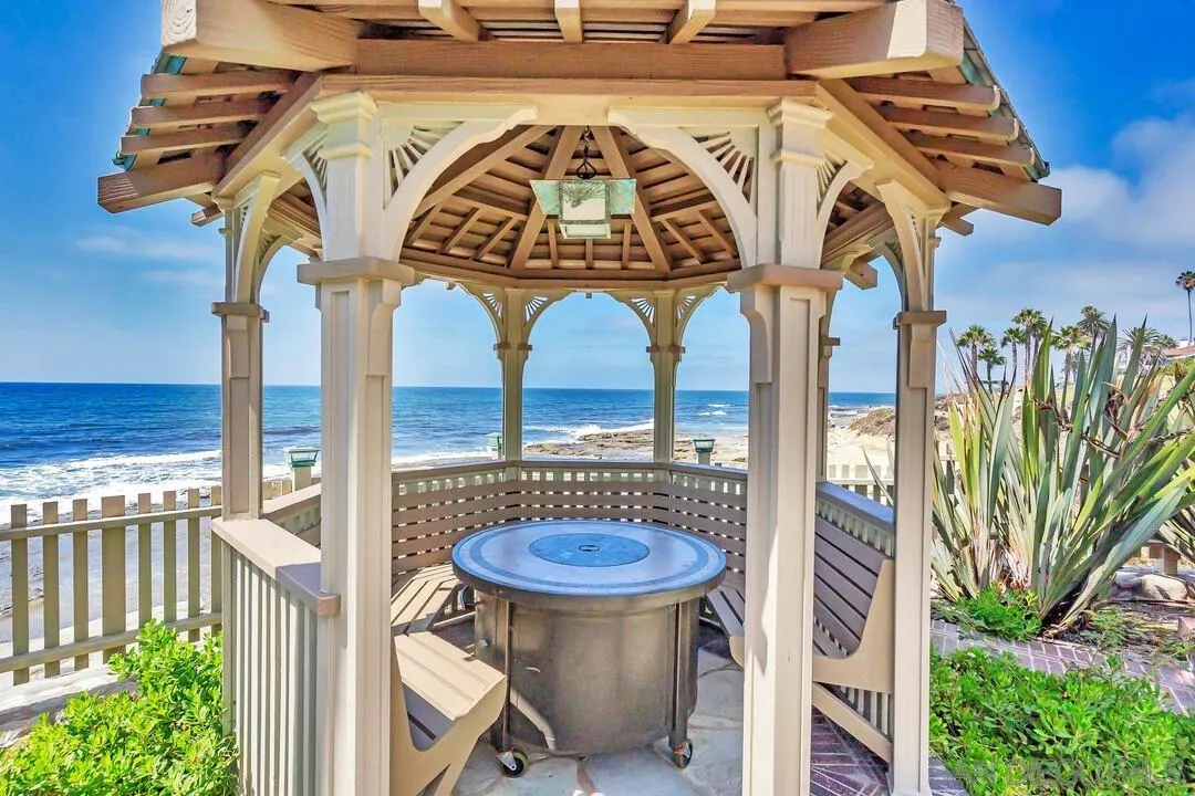 274 Coast Boulevard La Jolla, CA 92037 - Photo 54 of 64 a view of a balcony with table and chairs