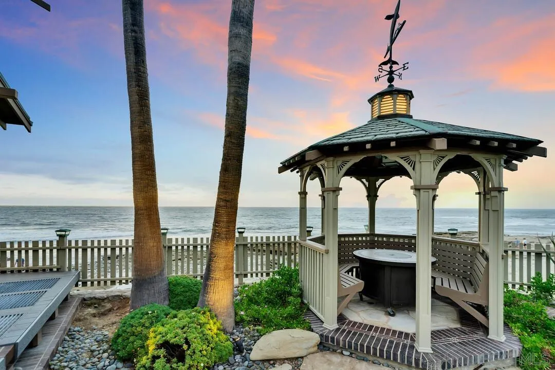 274 Coast Boulevard La Jolla, CA 92037 - Photo 56 of 64 a view of a terrace with a table and chairs