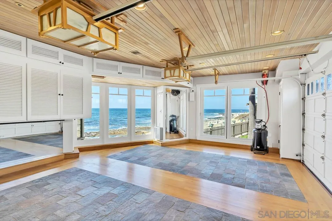 274 Coast Boulevard La Jolla, CA 92037 - Photo 61 of 64 a view of an empty room with a fireplace