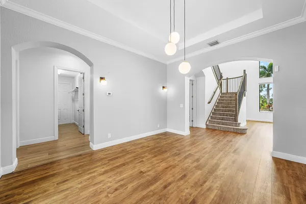 a kitchen with a refrigerator a sink and a oven