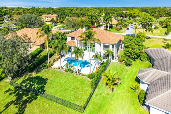 a view of a swimming pool with a garden