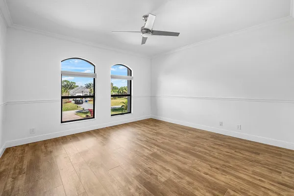 a view of wooden floor and a window