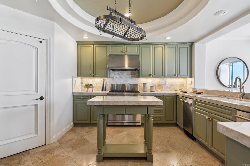 848 Prospect Street, Unit D La Jolla, CA 92037 - Photo 10 of 17 a kitchen with a sink cabinets and window