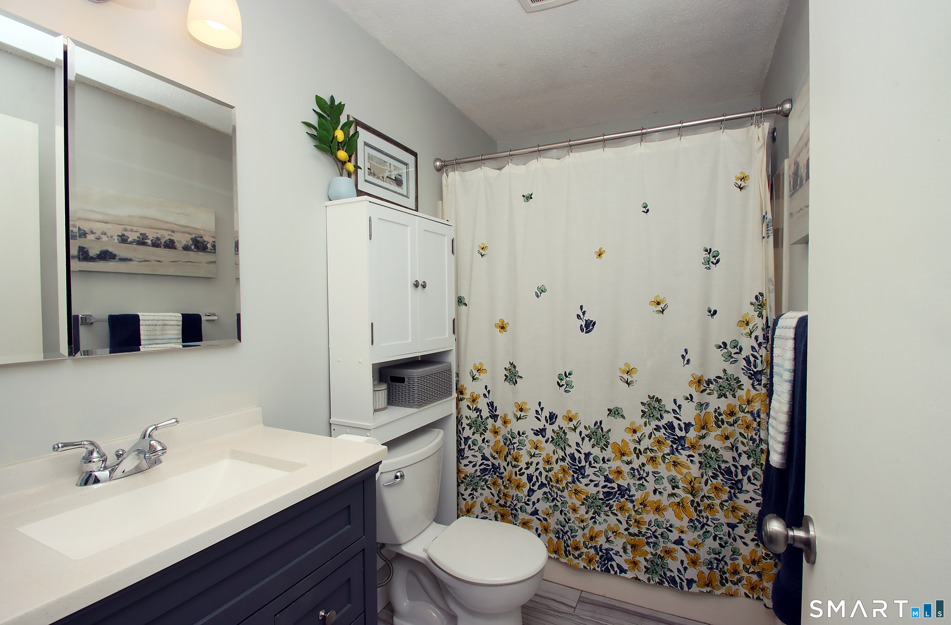 1081 New Haven Road, Unit 10C Naugatuck, CT 06770 - Photo 11 of 16 a bathroom with a sink toilet and shower