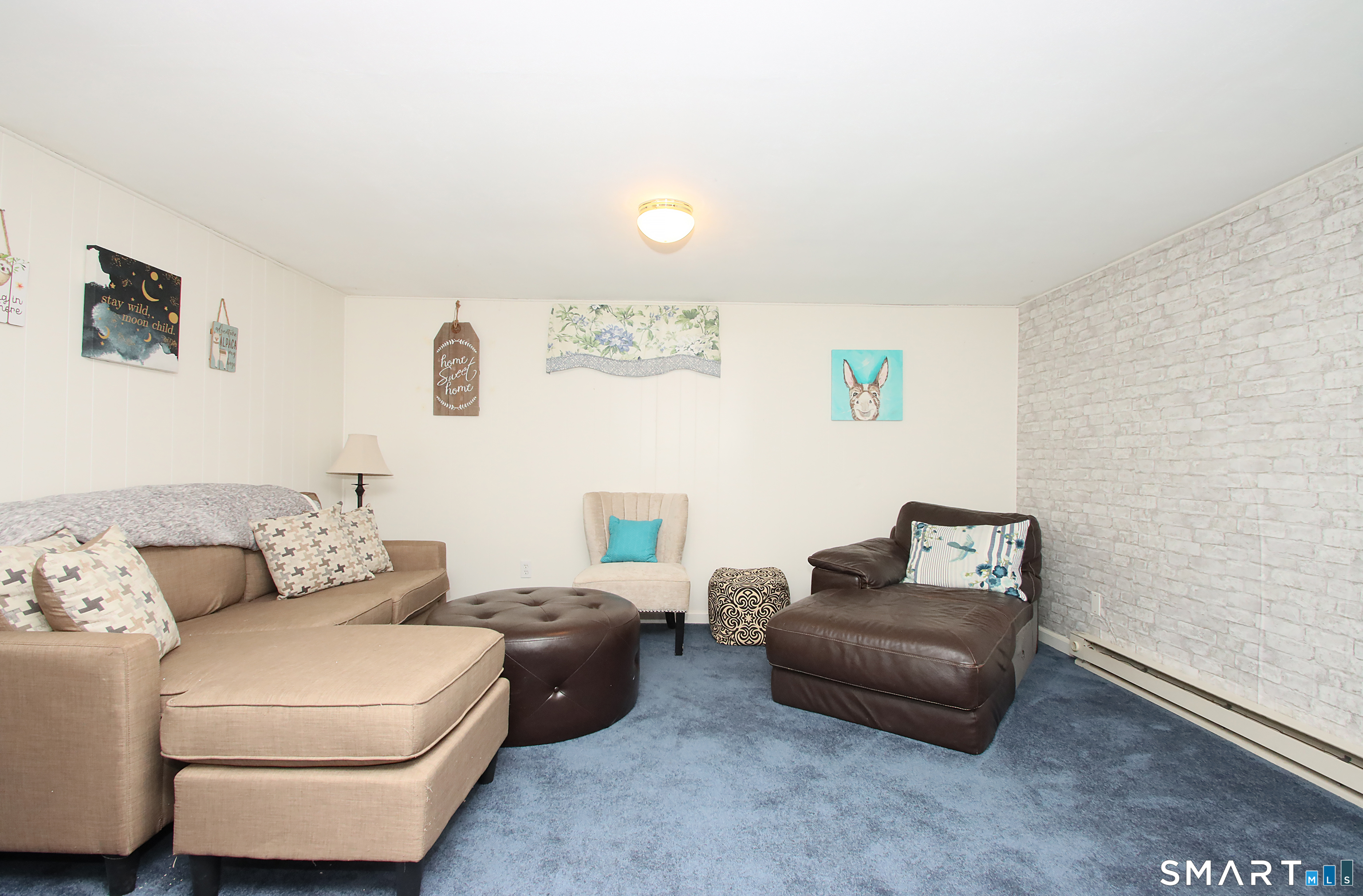 1081 New Haven Road, Unit 10C Naugatuck, CT 06770 - Photo 13 of 16 a living room with furniture and a couch