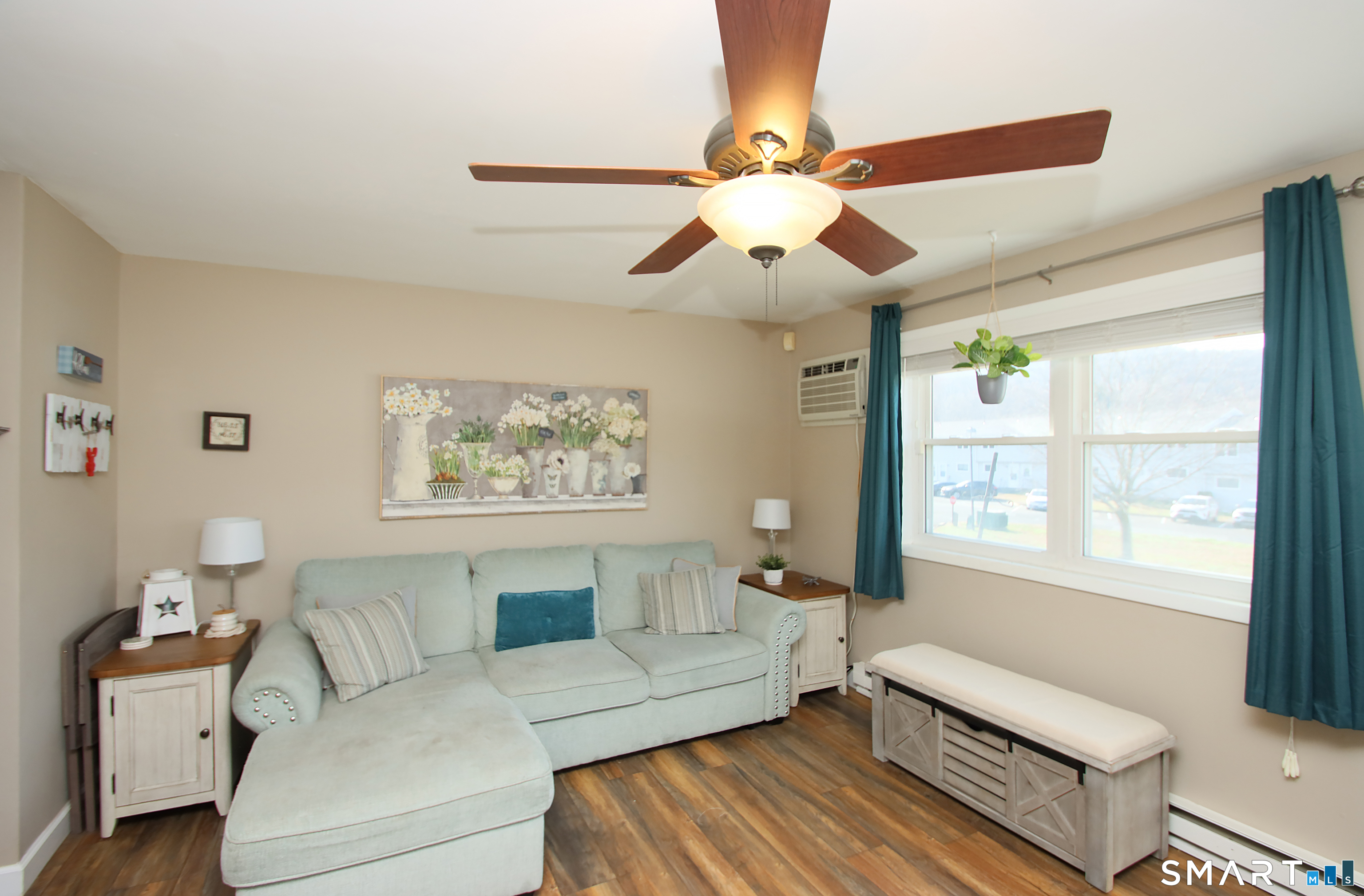1081 New Haven Road, Unit 10C Naugatuck, CT 06770 - Photo 2 of 16 a living room with furniture and a window