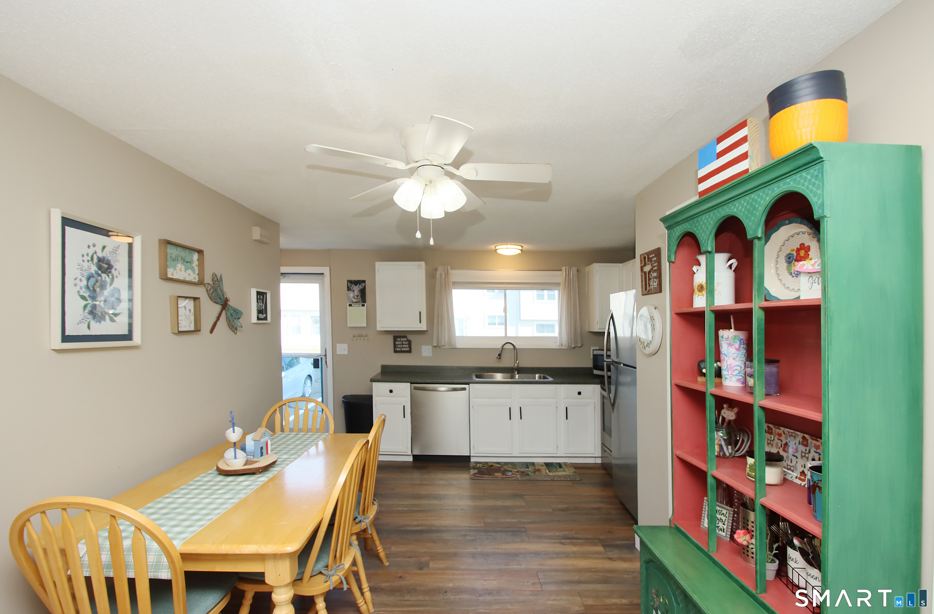 1081 New Haven Road, Unit 10C Naugatuck, CT 06770 - Photo 6 of 16 a kitchen with stainless steel appliances granite countertop a stove and a dining table