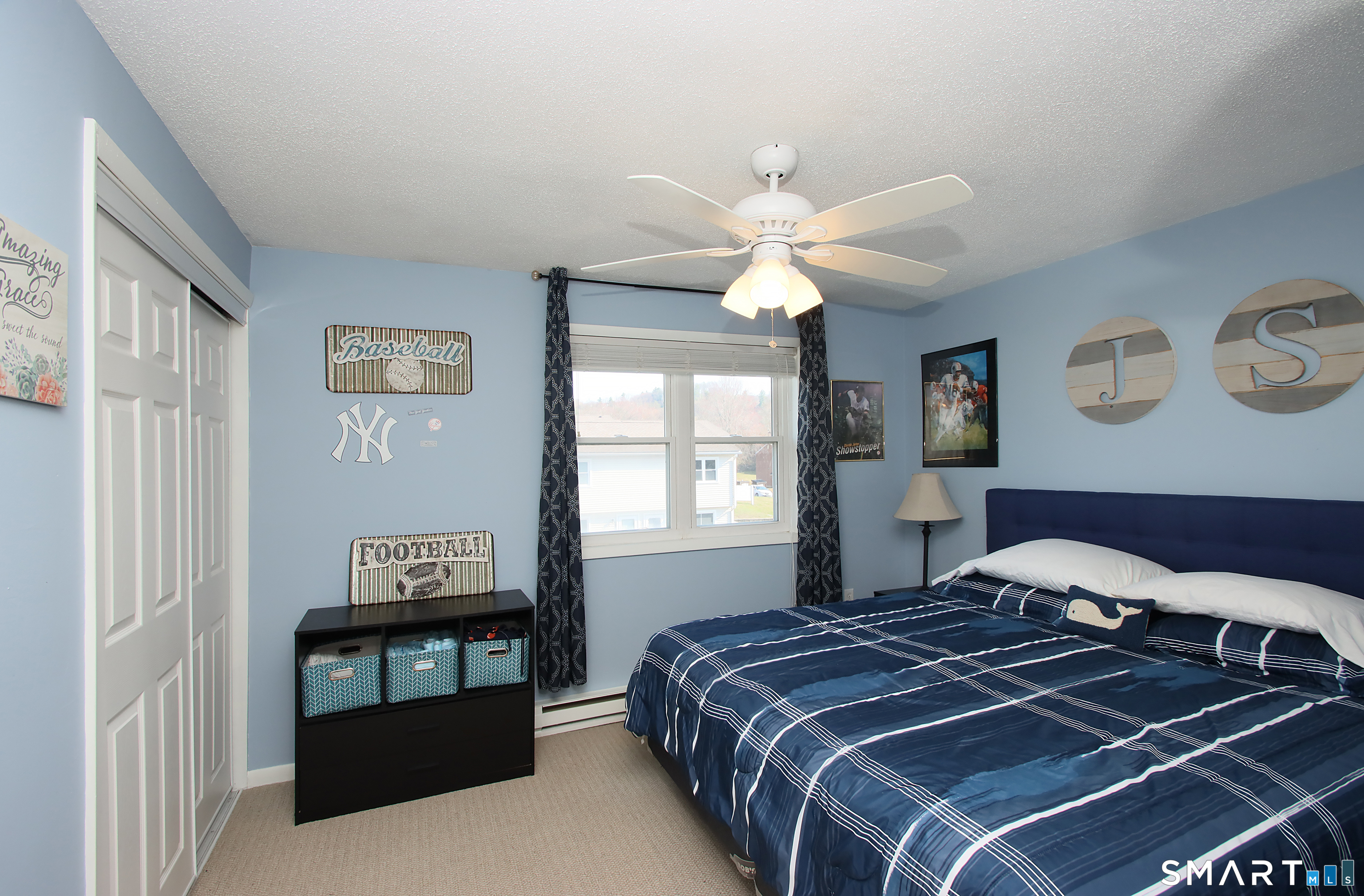 1081 New Haven Road, Unit 10C Naugatuck, CT 06770 - Photo 9 of 16 a bedroom with a bed and a window