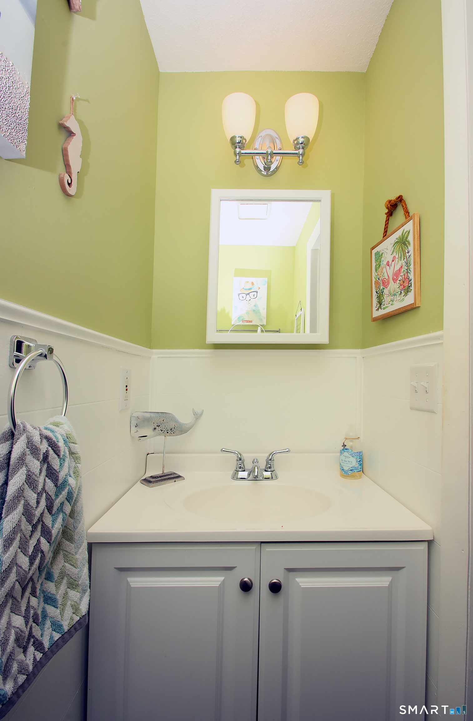 1081 New Haven Road, Unit 10C Naugatuck, CT 06770 - Photo 10 of 16 a bathroom with a sink and a mirror