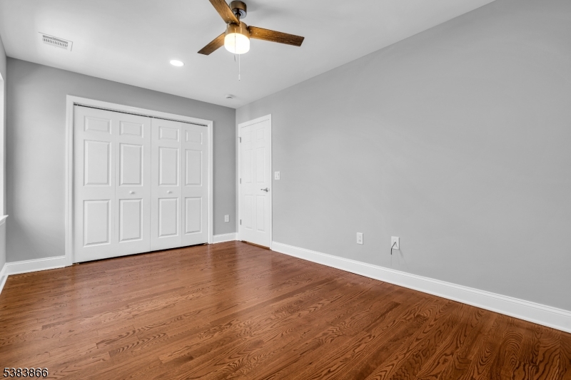 2000 Whittier Street Rahway, NJ 07065 - Photo 23 of 32 a view of an empty room with wooden floor