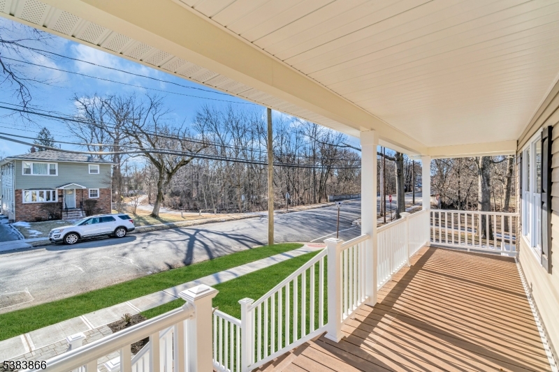 2000 Whittier Street Rahway, NJ 07065 - Photo 4 of 32 a view of a porch and wooden fence