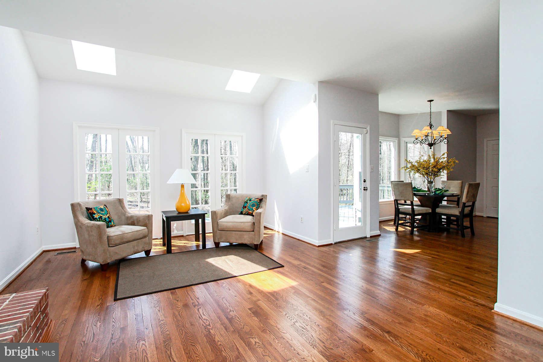6307 Hunting Ridge Lane McLean, VA 22101 - Photo 10 of 30 Family Room with two skylights