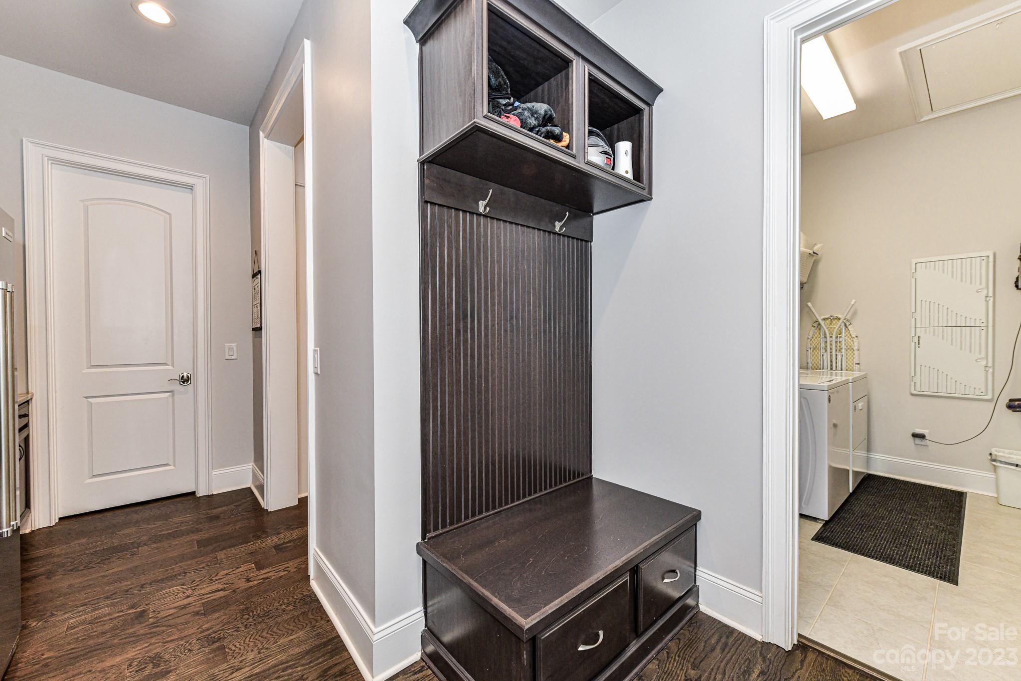 125 Turtleback Ridge, Unit 122 Matthews, NC 28104 - Photo 22 of 40 a view of an entryway with wooden floor
