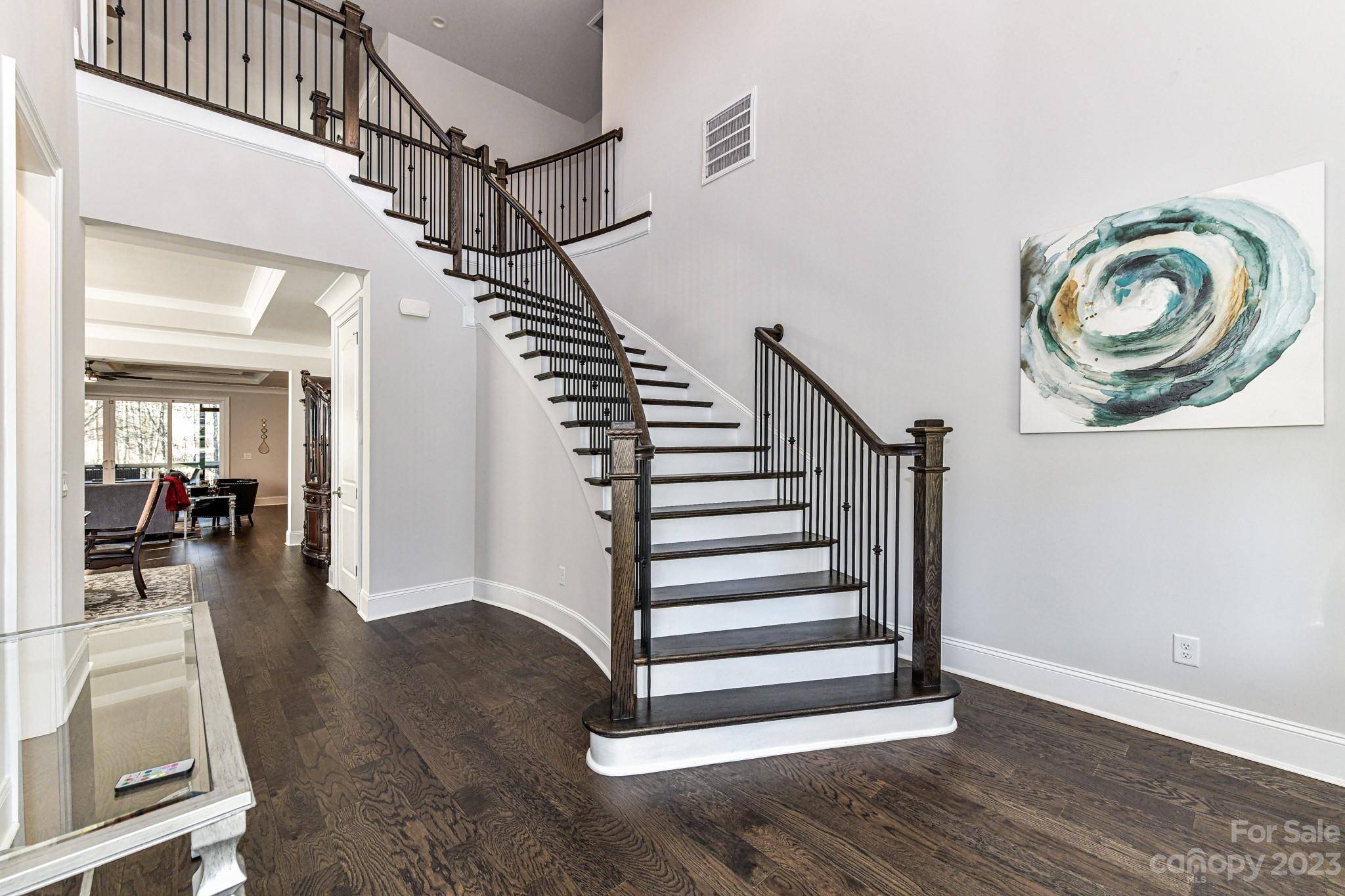 125 Turtleback Ridge, Unit 122 Matthews, NC 28104 - Photo 25 of 40 a view of entryway and hall with wooden floor