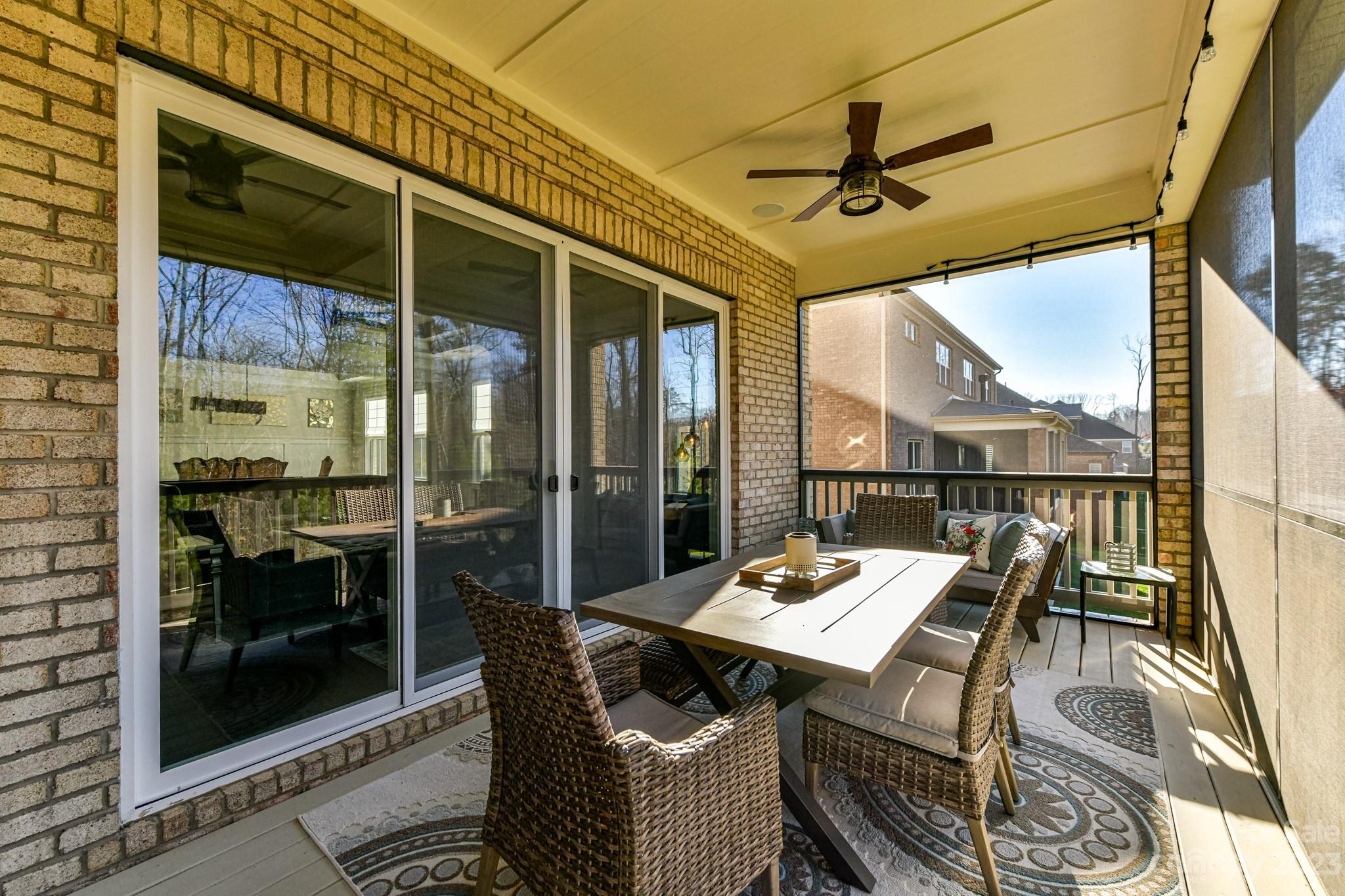 125 Turtleback Ridge, Unit 122 Matthews, NC 28104 - Photo 37 of 40 a view of a patio with a table and chairs