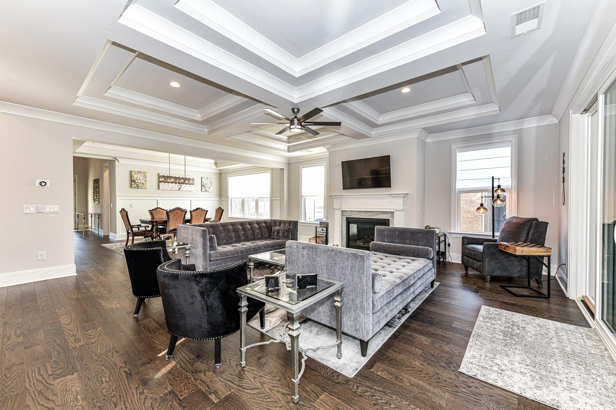 125 Turtleback Ridge, Unit 122 Matthews, NC 28104 - Photo 7 of 40 a view of a livingroom with furniture and a fireplace