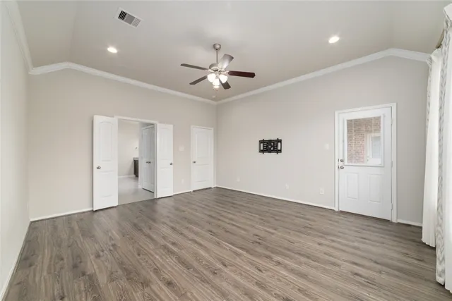 a bathroom with a granite countertop sink a large mirror and vanity