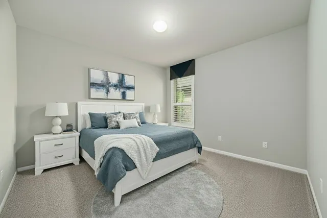 a view with granite countertop white cabinets and a granite counter tops