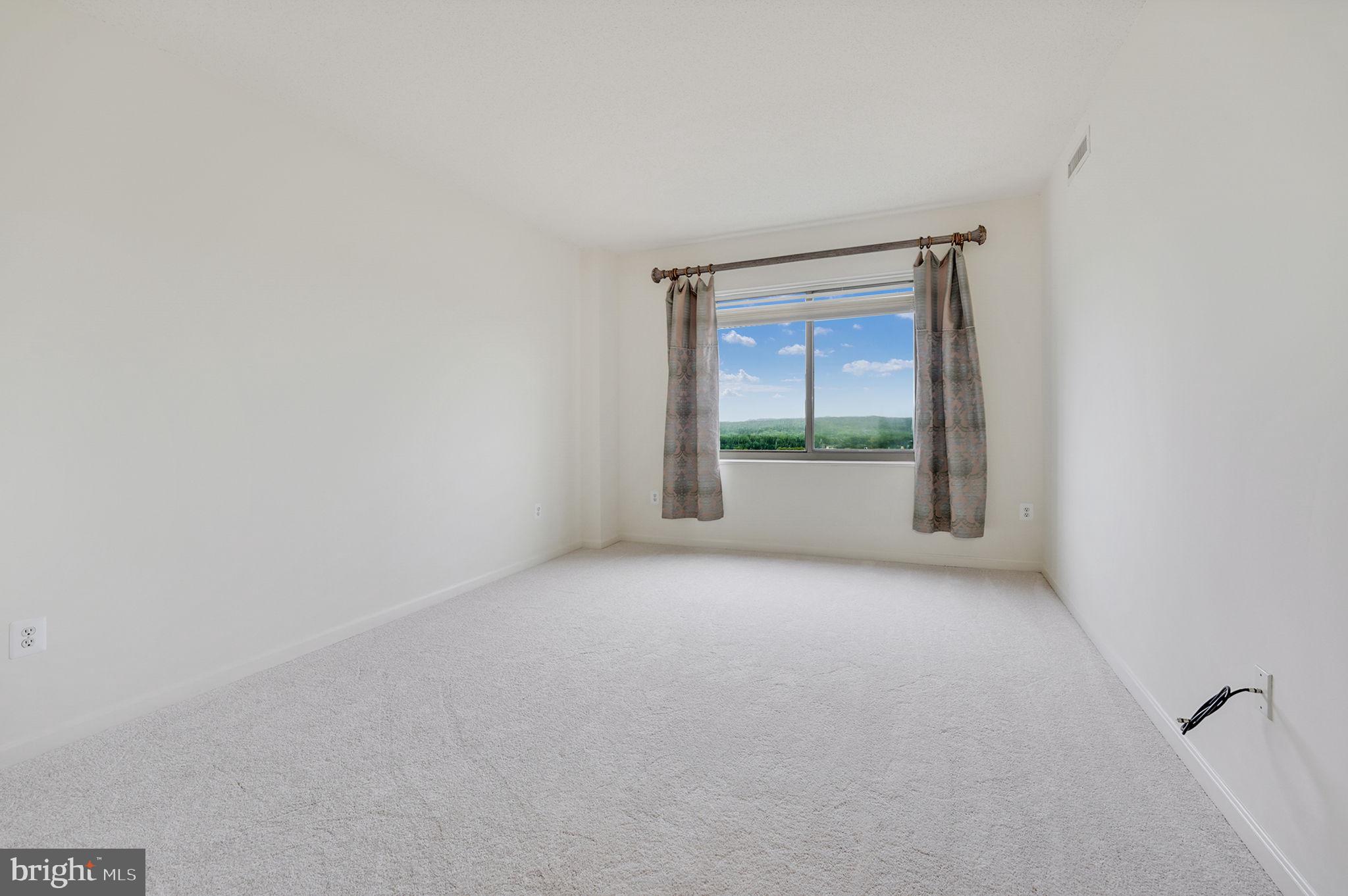 19355 Cypress Ridge Terrace, Unit 1111 Leesburg, VA 20176 - Photo 20 of 47 Primary bedroom with more amazing views.
