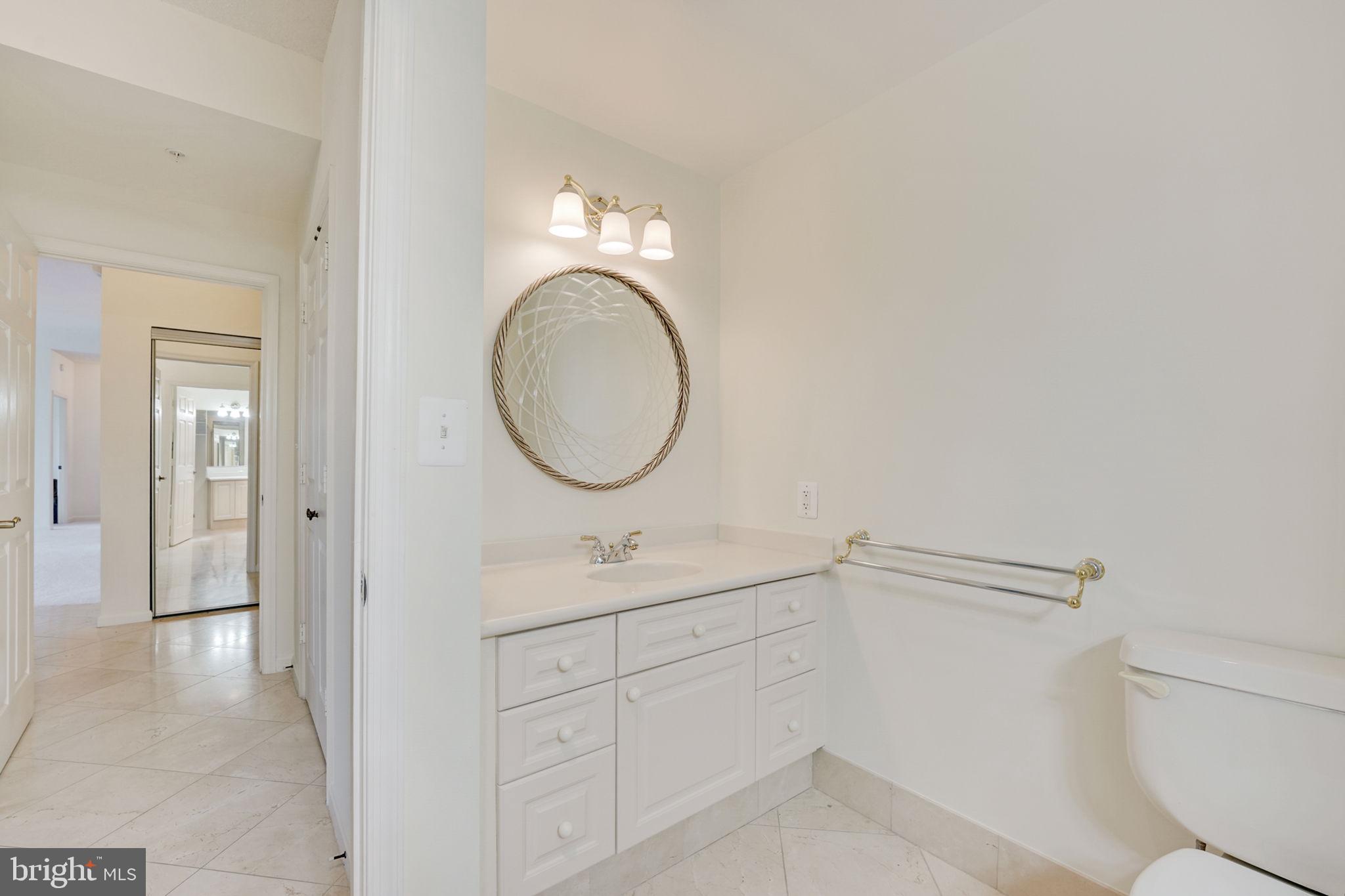 19355 Cypress Ridge Terrace, Unit 1111 Leesburg, VA 20176 - Photo 24 of 47 The marble flooring sparkles.