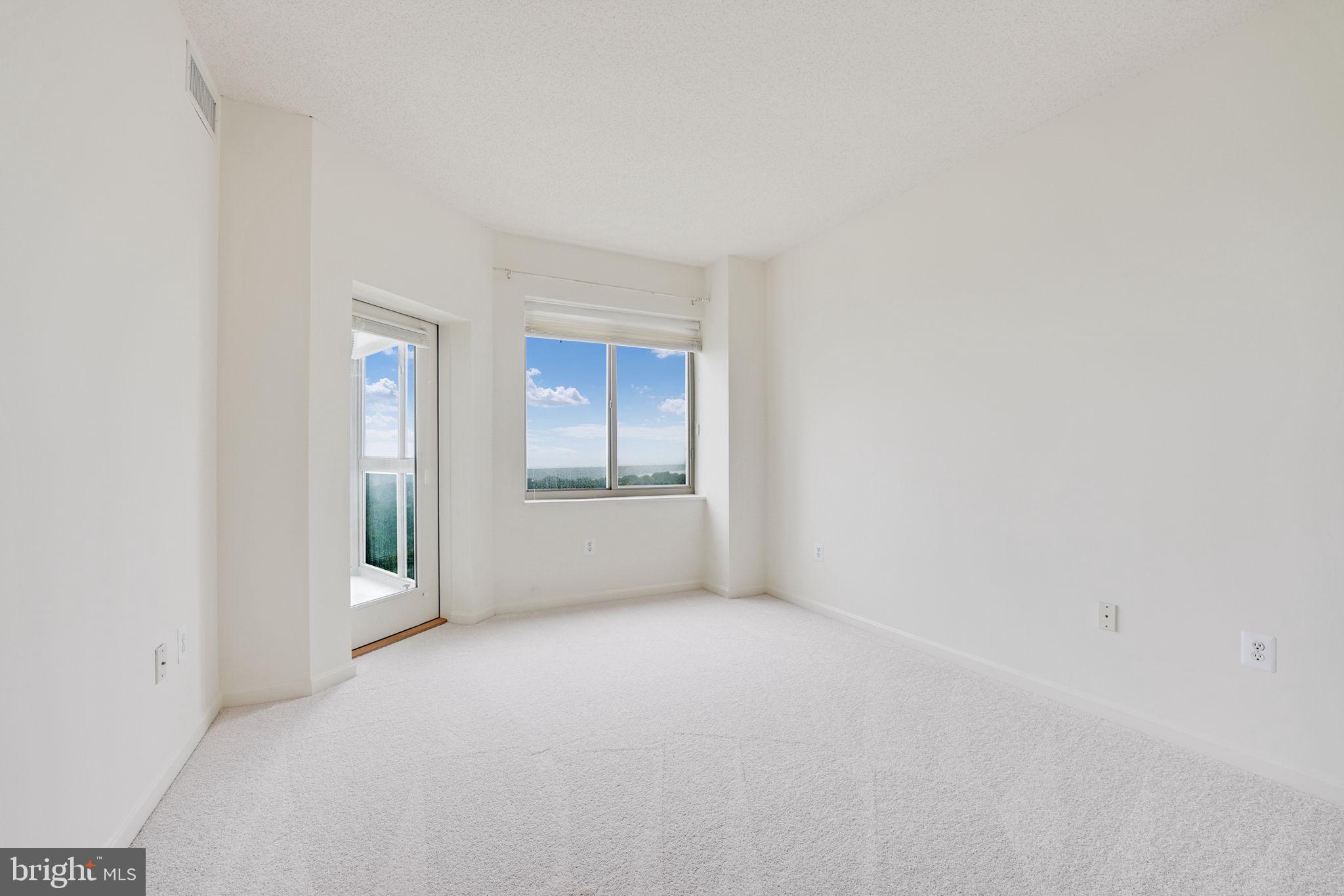 19355 Cypress Ridge Terrace, Unit 1111 Leesburg, VA 20176 - Photo 26 of 47 Second bedroom with access to sunroom.