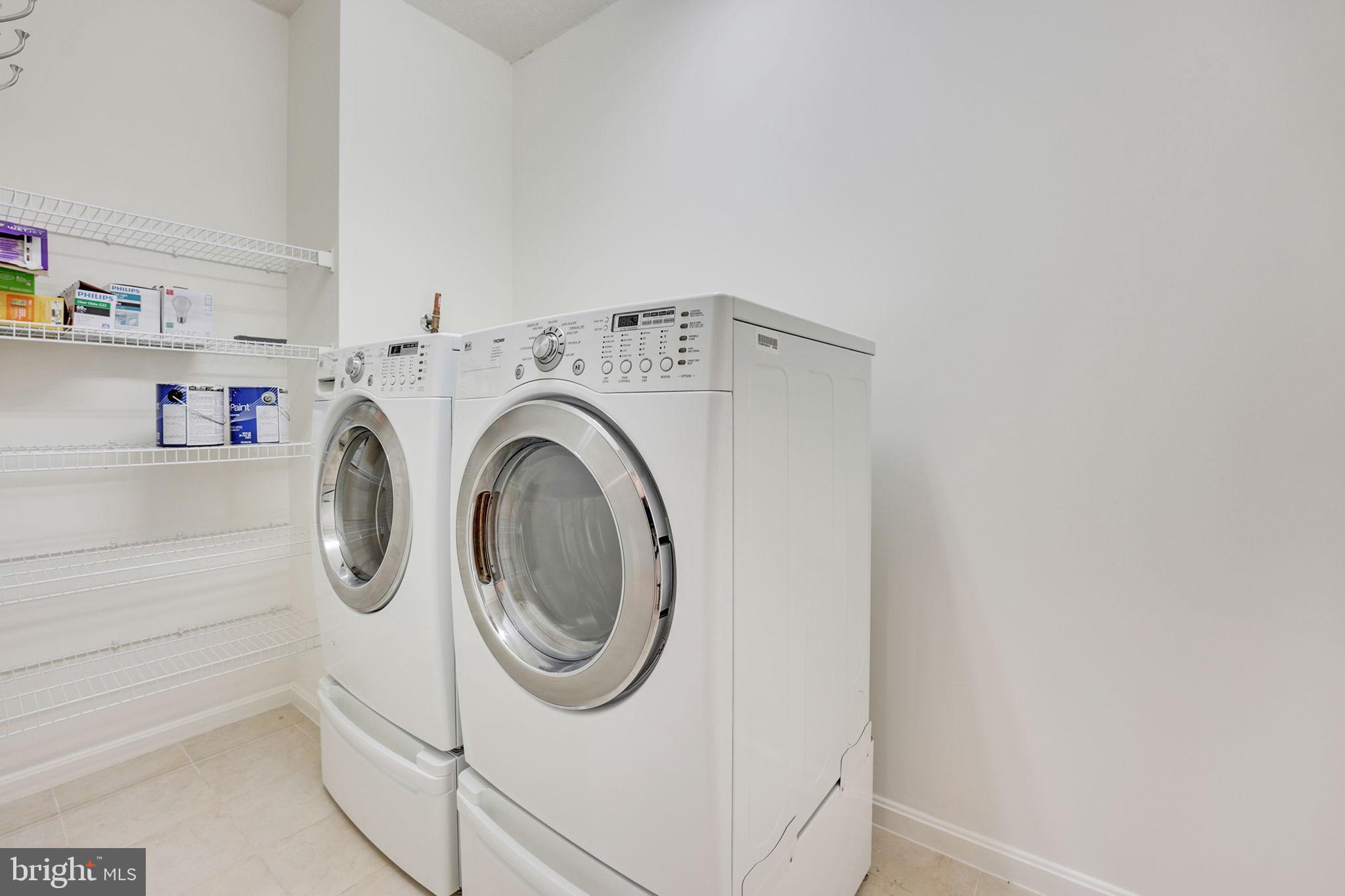 19355 Cypress Ridge Terrace, Unit 1111 Leesburg, VA 20176 - Photo 30 of 47 Ample laundry room with ceramic tile floor