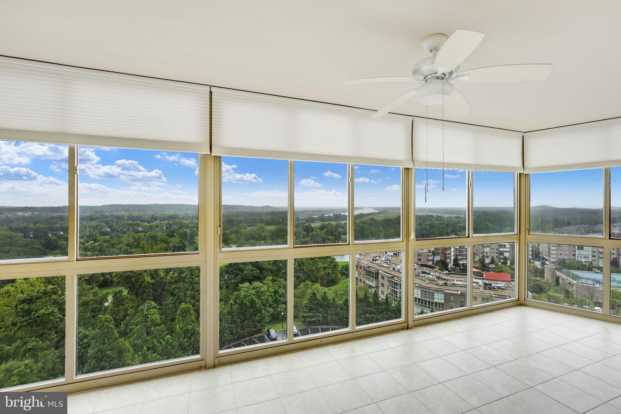 19355 Cypress Ridge Terrace, Unit 1111 Leesburg, VA 20176 - Photo 31 of 47 Sunroom with unparalleled river views