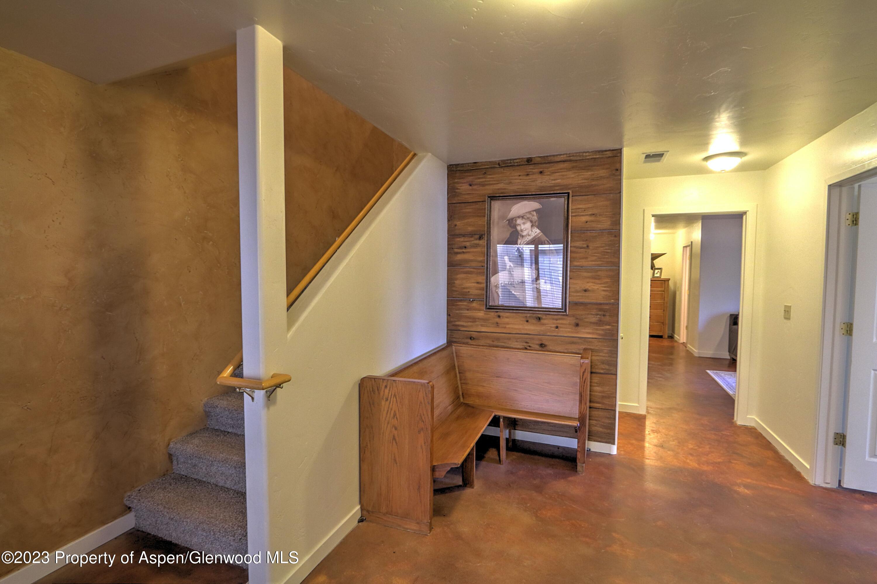 581 Park Avenue Rifle, CO 81650 - Photo 3 of 27 a view of a hallway with staircase