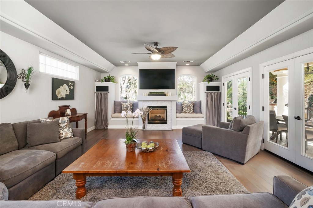 155 Conover Lane Templeton, CA 93465 - Photo 17 of 75 a living room with furniture a flat screen tv and a fireplace