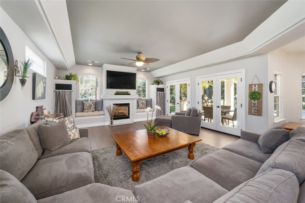 155 Conover Lane Templeton, CA 93465 - Photo 18 of 75 a living room with furniture a flat screen tv and a fireplace
