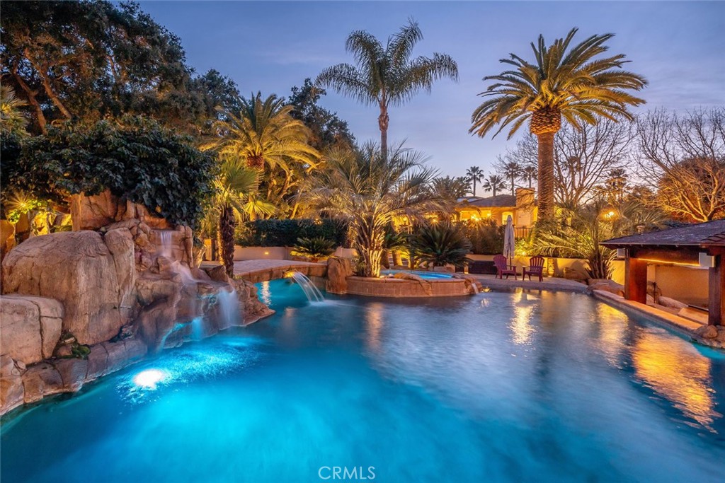 155 Conover Lane Templeton, CA 93465 - Photo 2 of 75 a view of a swimming pool with a table and chairs