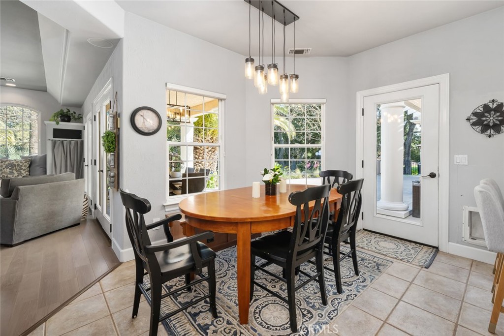 155 Conover Lane Templeton, CA 93465 - Photo 25 of 75 a view of a dining room with furniture window and wooden floor