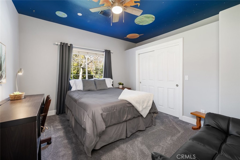 155 Conover Lane Templeton, CA 93465 - Photo 36 of 75 a spacious bedroom with a bed and a desk