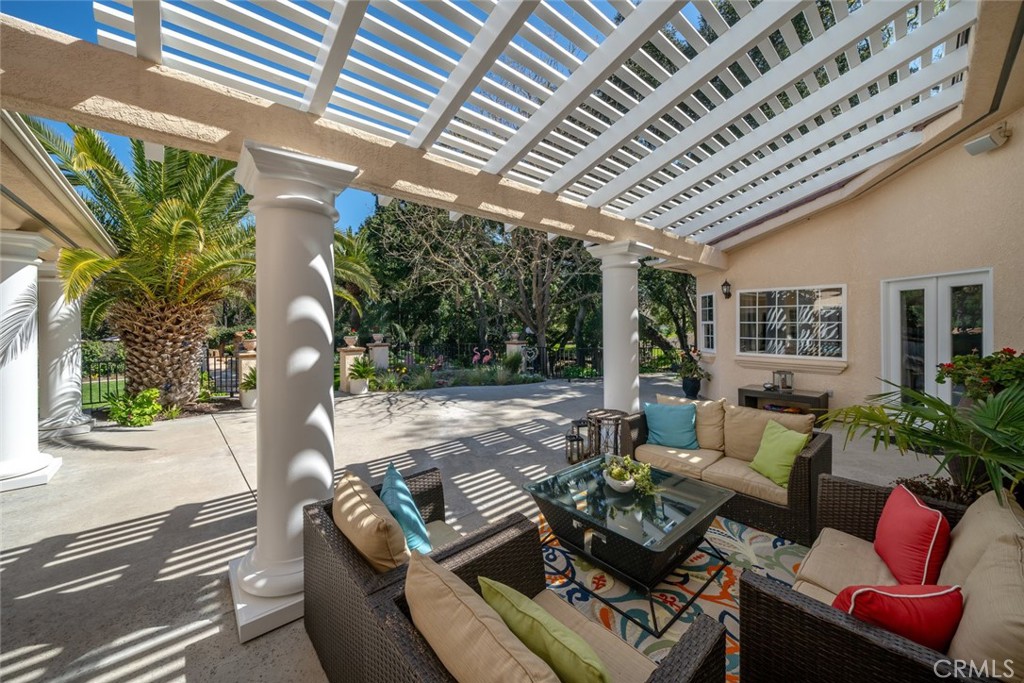 155 Conover Lane Templeton, CA 93465 - Photo 43 of 75 a view of a patio with couches chairs and a potted plant