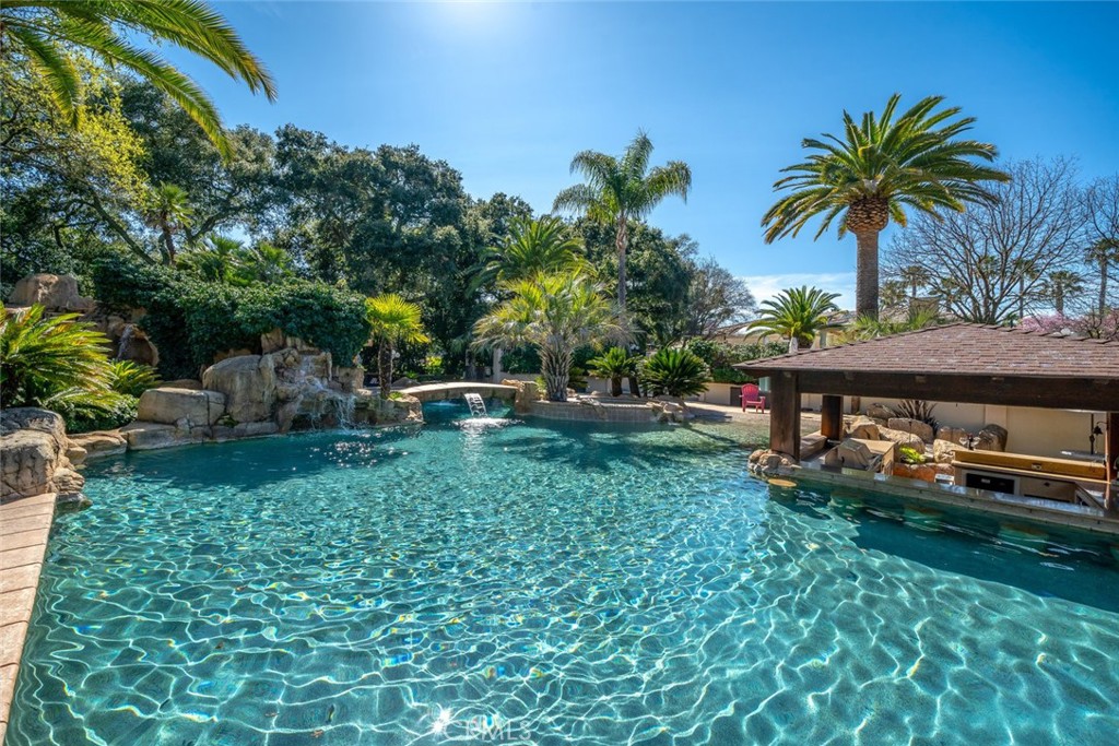 155 Conover Lane Templeton, CA 93465 - Photo 60 of 75 a backyard of a house with plants and outdoor seating