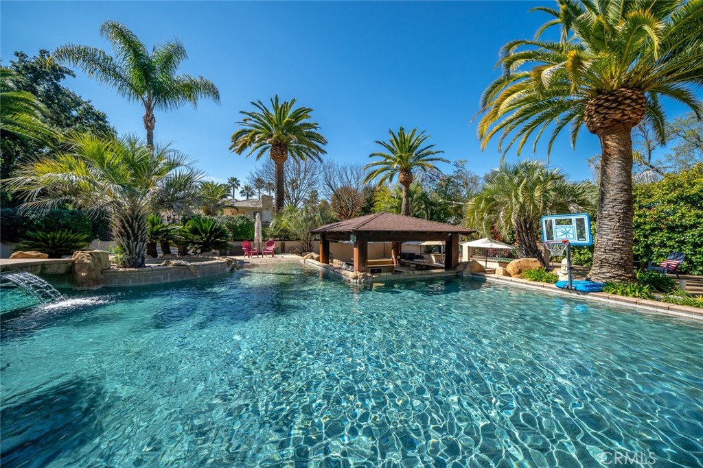 155 Conover Lane Templeton, CA 93465 - Photo 62 of 75 a view of a yard with a table and chairs under an umbrella