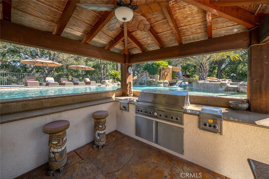 155 Conover Lane Templeton, CA 93465 - Photo 65 of 75 a kitchen with stainless steel appliances granite countertop a stove a sink and a refrigerator