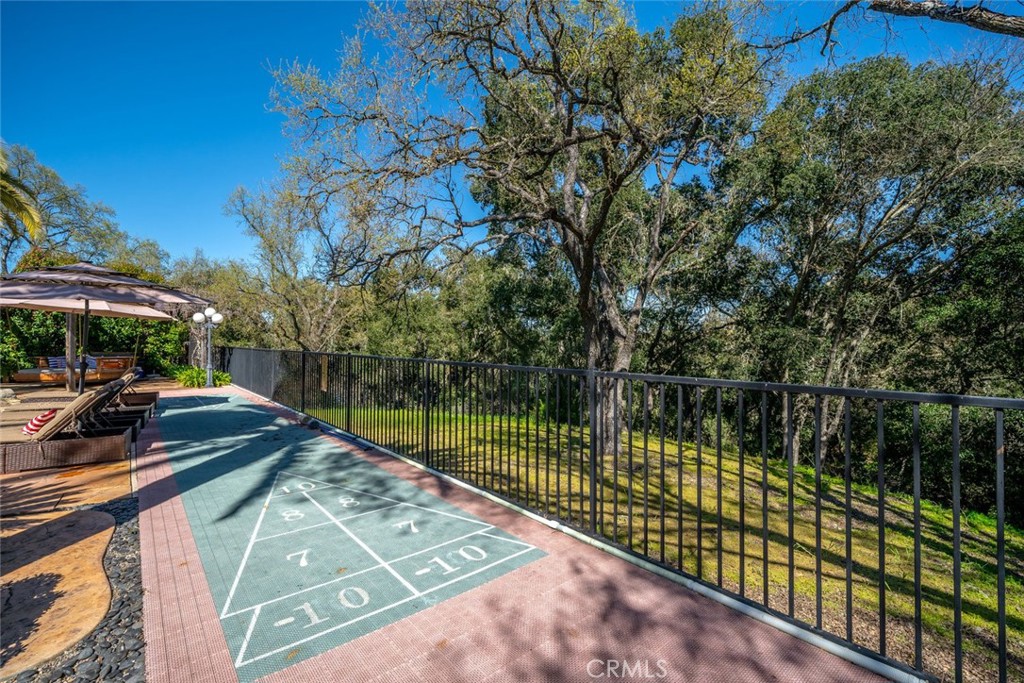 155 Conover Lane Templeton, CA 93465 - Photo 71 of 75 a view of a lake with a bench next to a lake