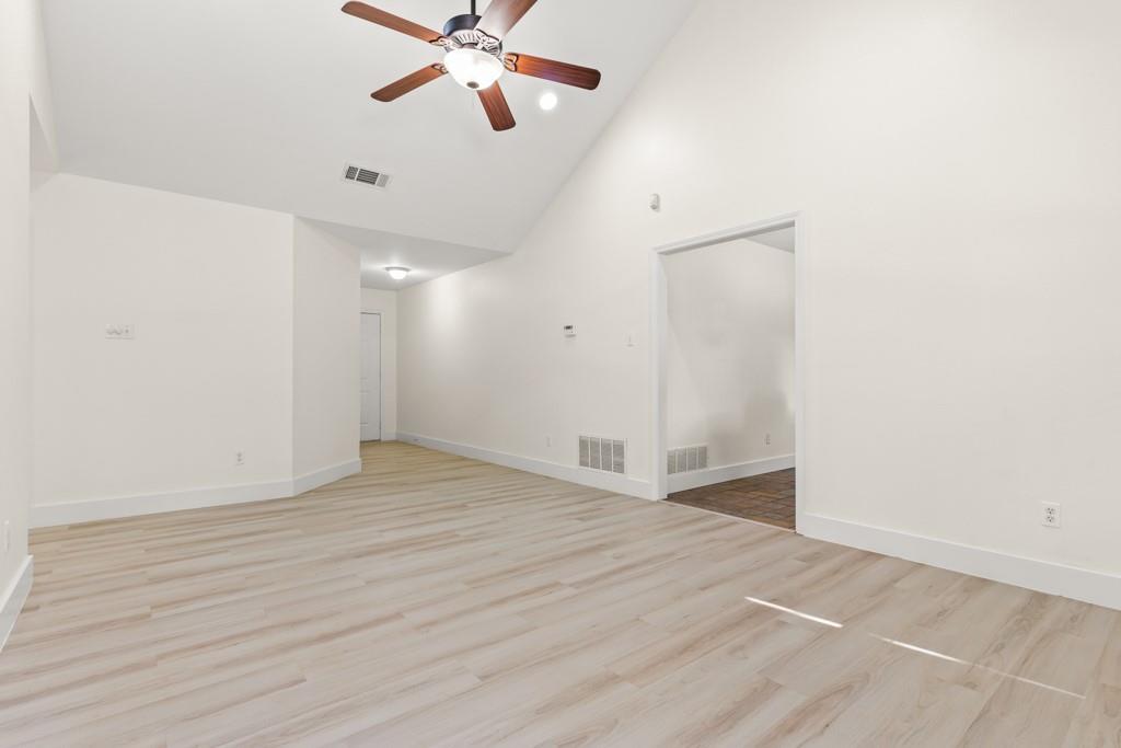 804 Alta Street Longview, TX 75604 - Photo 4 of 20 wooden floor in an empty room