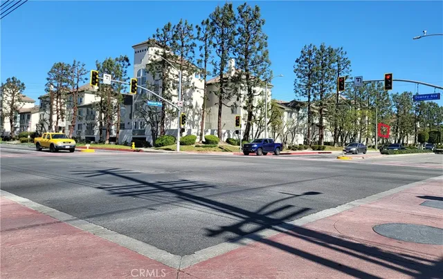 a view of a street with cars