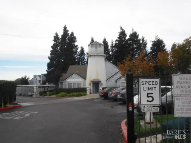 a view of a street with cars