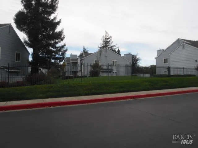 a view of building with yard