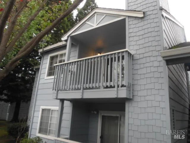 a view of a house with a deck