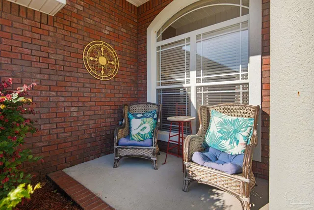 a bench sitting in front of a door