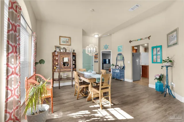 a view of a livingroom with furniture and a table