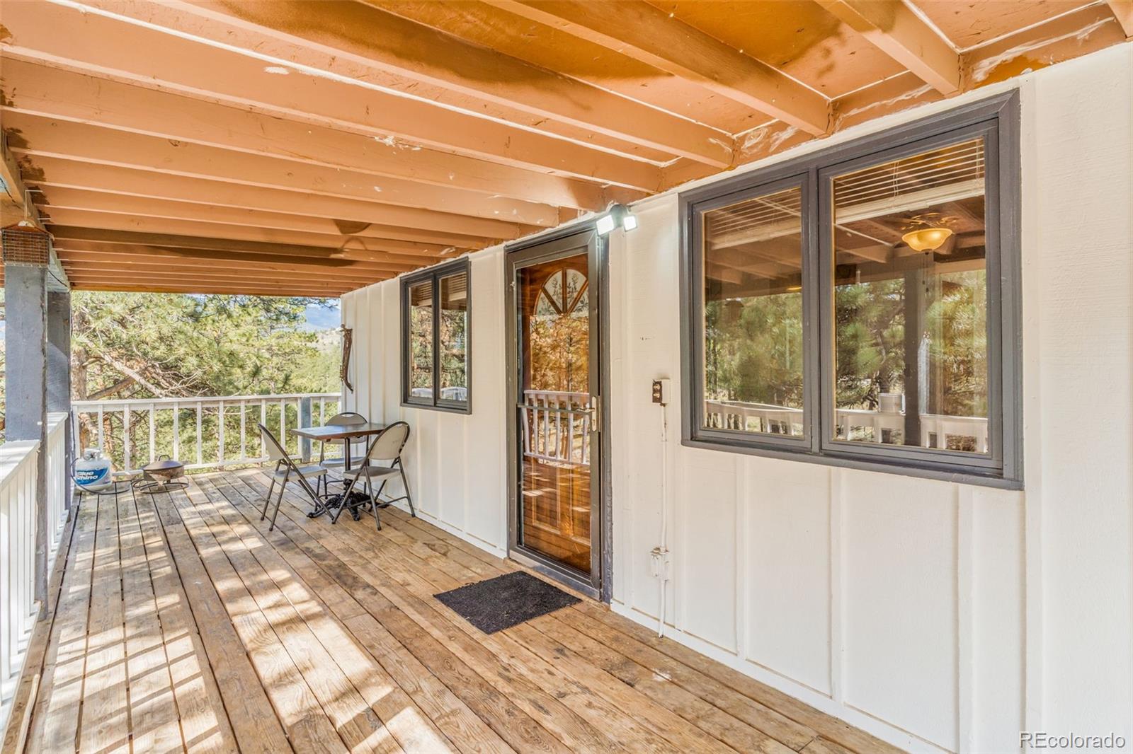 145 Bailey Drive Bailey, CO 80421 - Photo 3 of 21 a bath room with a large window