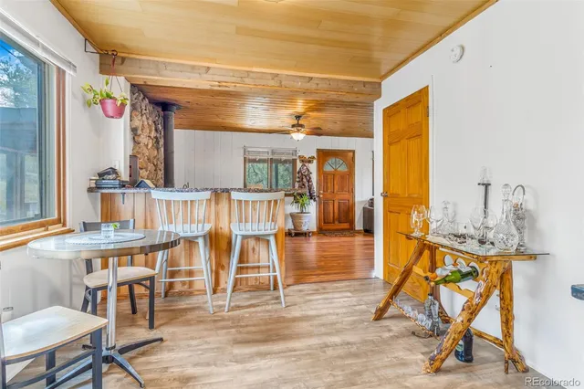 a view of a livingroom with furniture and a table