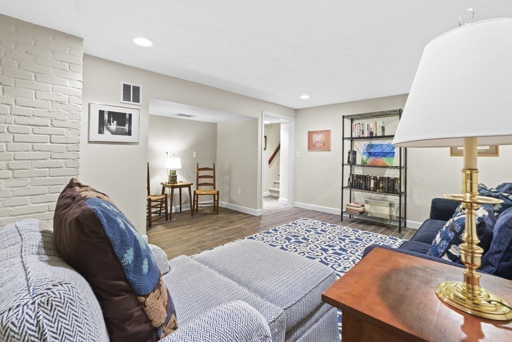 118 Parker Road Wellesley, MA 02482 - Photo 26 of 33 a living room with furniture and a flat screen tv